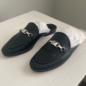 Michael by Michael Kors black mules with silver hardware